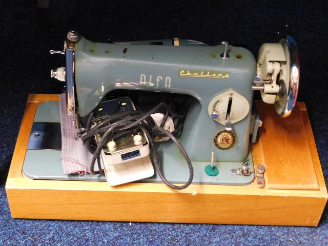 A cased electric sewing machine