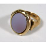 A 9ct gold ring set with opal slice size J