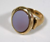 A 9ct gold ring set with opal slice size J