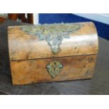 A small walnut veneered stationary box with brass