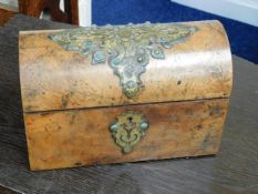 A small walnut veneered stationary box with brass