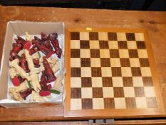 A chess set with board
