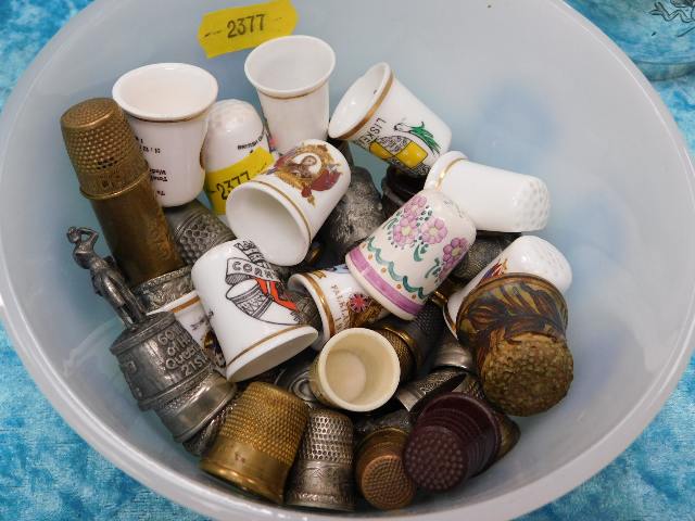 A quantity of metal & ceramic thimbles