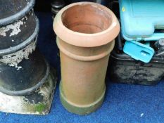 A large terracotta chimney pot 24in high