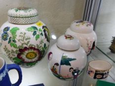 A small Chinese ginger jar twinned with two others