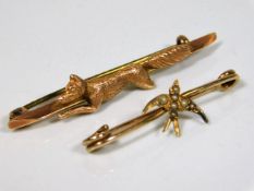 A 9ct rose gold fox brooch, loss to hind leg twinn