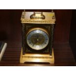 A decorative quartz mantle clock