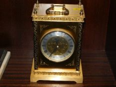 A decorative quartz mantle clock