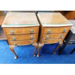 A pair of walnut veneer bedside tables each with t