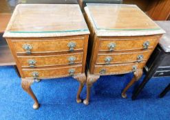 A pair of walnut veneer bedside tables each with t