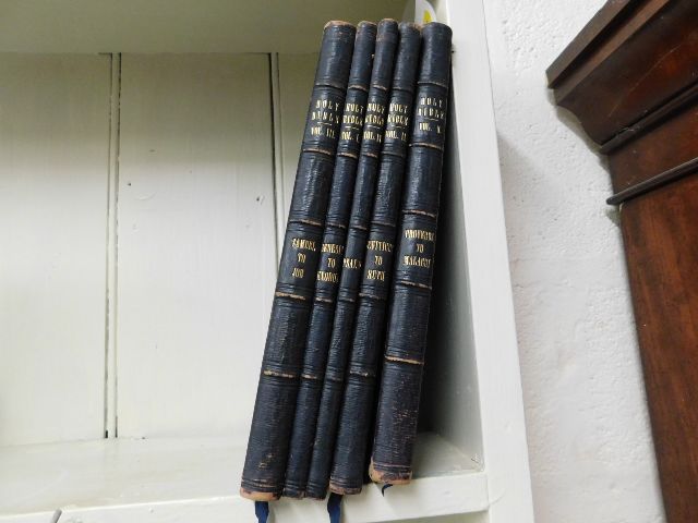 A 19thC. Bible, in five volumes with gilded pages