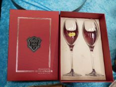 A boxed pair of Bollinger champagne glasses