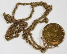A 1981 South African 22ct half Krugerrand gold coin with 9ct gold chain & coin holder approx. 30.5g