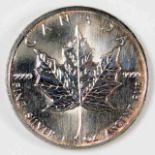 A Canadian 0.999 fine silver Maple Leaf five dolla