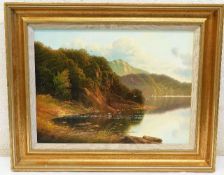 A framed Andrew Grant Kurtis oil on canvas of lake