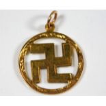 A 9ct gold swastika good luck charm pendant approx