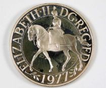 A 1977 silver proof silver jubilee crown, no case