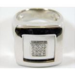 A substantial 18ct white gold ring set with diamon