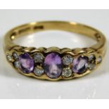A 9ct gold ring set with amethyst & diamond approx