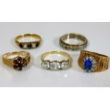 Five 9ct gold rings set with various paste & stone