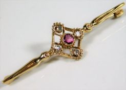 A 9ct gold brooch set with diamond & ruby approx.