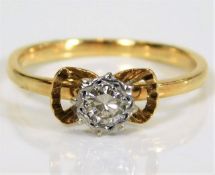 A yellow metal, tests at 18ct, diamond ring approx. 2.5g, size M £100-150