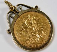 A Victorian 1888 full gold sovereign within 9ct gold holder approx. 9.9g