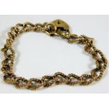 A 9ct gold rope twist link bracelet with padlock a