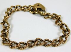 A 9ct gold rope twist link bracelet with padlock a