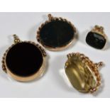 Two Victorian gold mounted fobs, one gold backed w