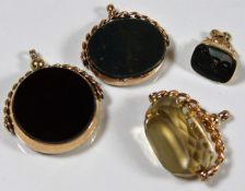 Two Victorian gold mounted fobs, one gold backed w