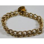 A 9ct gold bracelet with padlock approx. 34.4g