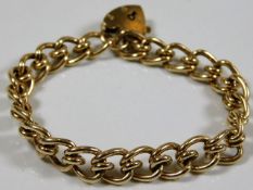 A 9ct gold bracelet with padlock approx. 34.4g