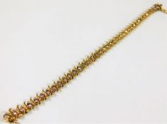 A 14ct gold bracelet set with 4ct of diamonds appr