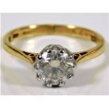 An 18ct gold ring with Tiffany style mounted diamond of 1.25ct approx. 3.6g size O