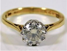 An 18ct gold ring with Tiffany style mounted diamond of 1.25ct approx. 3.6g size O