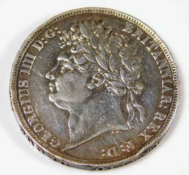 An 1822 George IV silver crown Provenance: From Ho