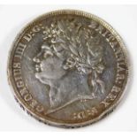 An 1822 George IV silver crown Provenance: From Ho