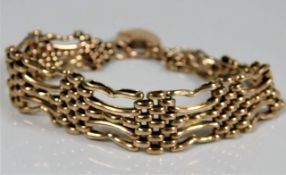 A five bar gate 9ct rose gold bracelet with padloc