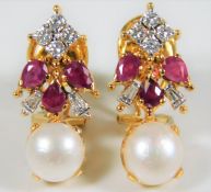 A pair of 18ct gold (tested) earrings set with diamonds, Burma ruby & pearl
