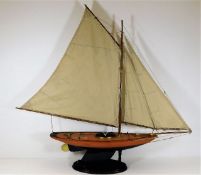 A model yacht & stand named Bluebell M.Y.C. 39in w