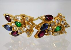 A pair of 21ct gold earrings set with ruby & other