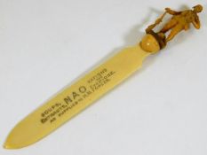 An HM Forces early plastic letter opener