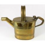 A brass watering can after Christopher Dresser 12i