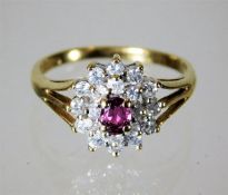 A 9ct gold ruby & diamond cluster ring 2.3g size L