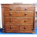 A 19thC. mahogany chest of drawers with ivory escu