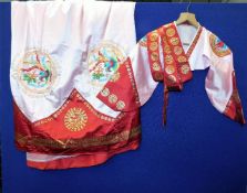 A traditional Korean embroidered silk wrap with to