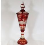 A c.1900 cut glass Bohemian lidded cup with deer d
