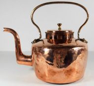 A large Georgian copper kettle with brass handle 1