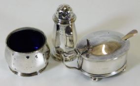 A matched silver cruet set